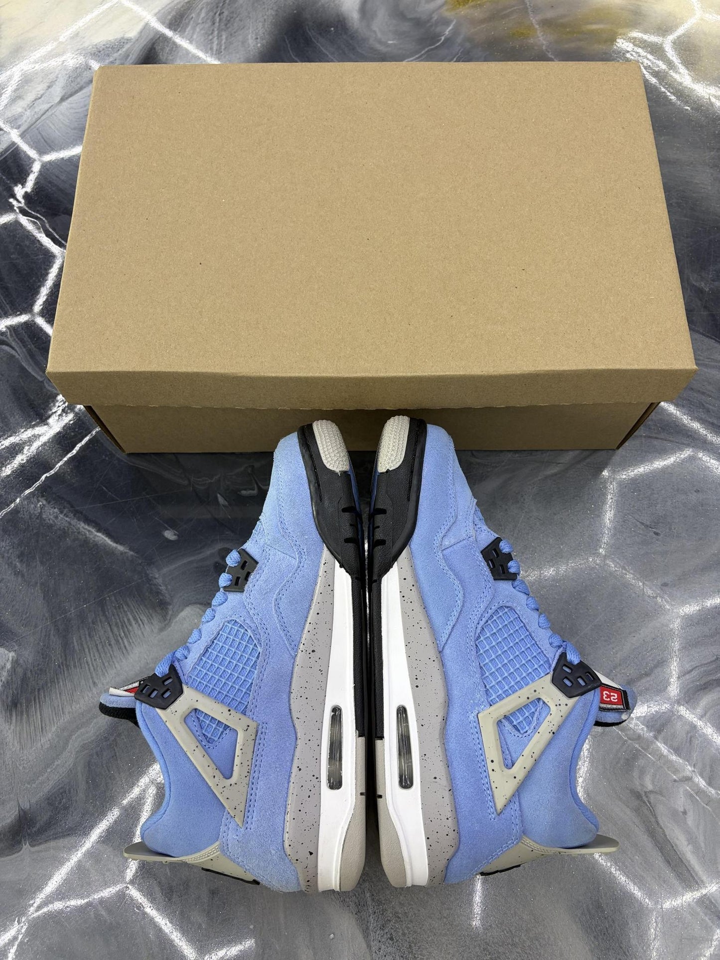 Jordan 4 "University Blue" Used Size 5Y/6.5W