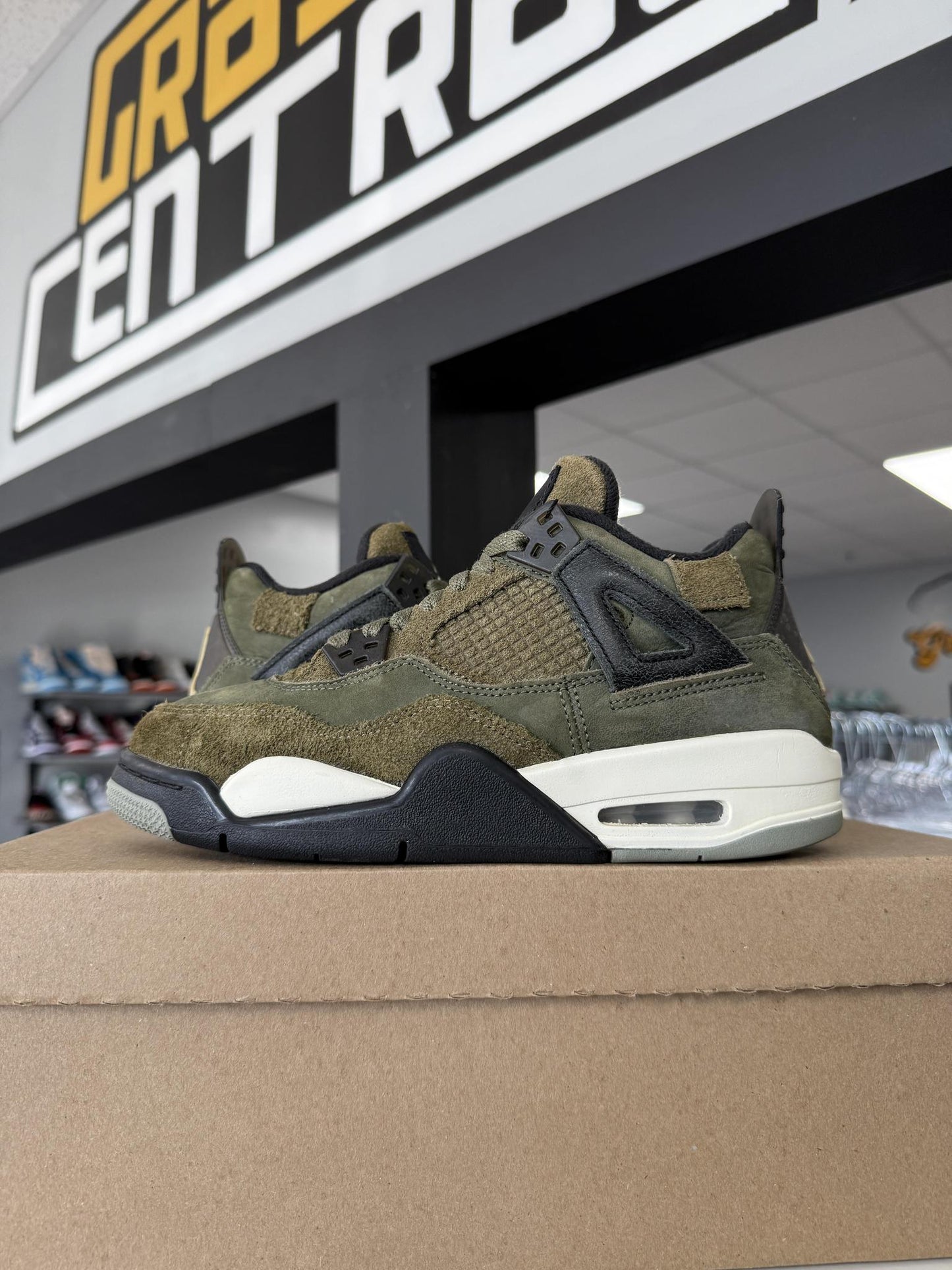 Jordan 4 "Craft Olive" Used Size 6Y/7.5W
