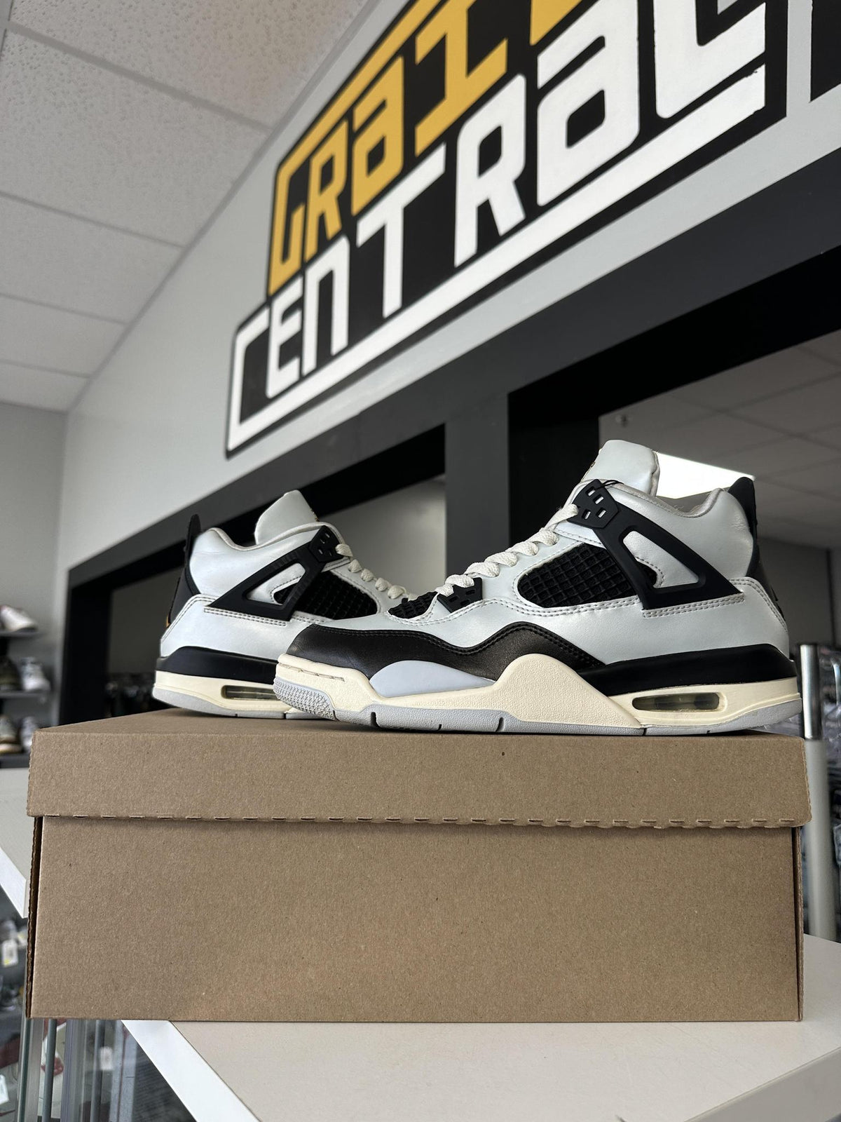 Jordan 4 Platinum Gold Used